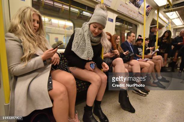 People ride the London Underground without trousers as they attend the 11th No Trousers Tube Ride on January 12, 2020 in London, England. Originating...