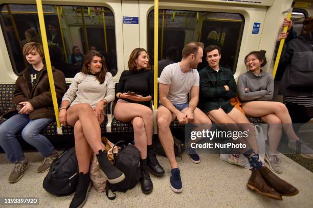 People ride the London Underground without trousers as they attend the 11th No Trousers Tube Ride on January 12, 2020 in London, England. Originating...