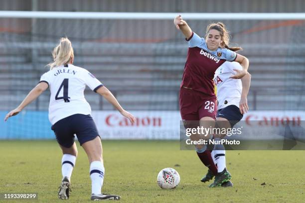 Tessel Middag of West Ham United Women getting tackled by Ria Percival of Tottenham Hotspur Women during the Barclays FA Women's Super League match...