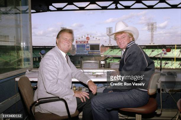 Chicago White Sox broadcaster Ken Harrelson poses for a photo in the broadcast booth with partner Don Drysdale prior to an MLB game at Comiskey Park...