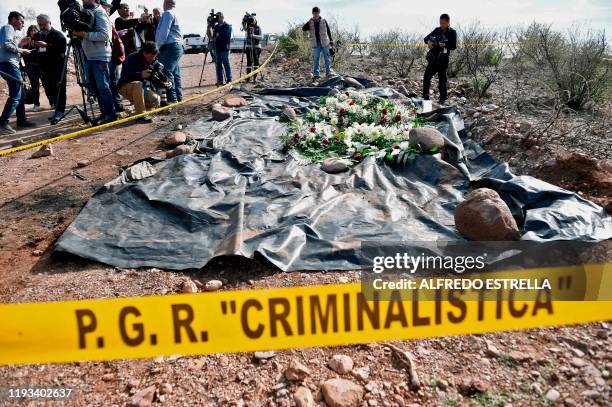 The press surrounds the site where nine Mormon women and children were murdered past November in an ambush, in Galeana, Chihuahua state, Mexico, on...