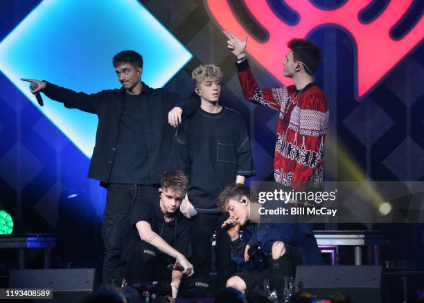 Daniel Seavey, Corbyn Besson, Jonah Marais, Zach Herron, and Jack Avery of 'Why Don't We' perform onstage during Q102's Jingle Ball 2019 Presented by...