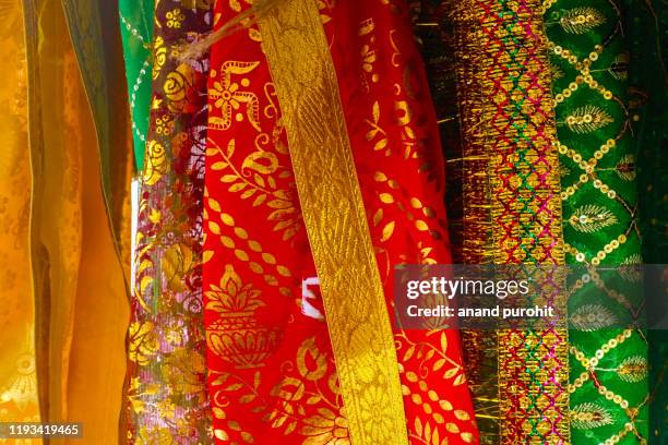 colourful traditional indian cloth - indian culture background stock pictures, royalty-free photos & images