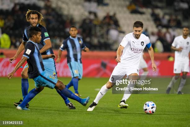 Gabriel Fernández Arenas of Al Sadd drives the ball during the FIFA Club World Cup First Round between Al Sadd and Hienghène Sport at the Jassim bin...