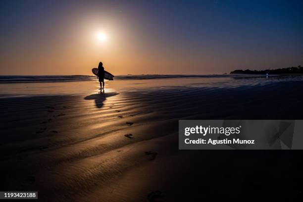 full moon surf - nosara costa rica stock pictures, royalty-free photos & images