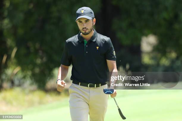 Abraham Ancer of Mexico and the International team reacts to his putt on the 13th green during Thursday four-ball matches on day one of the 2019...