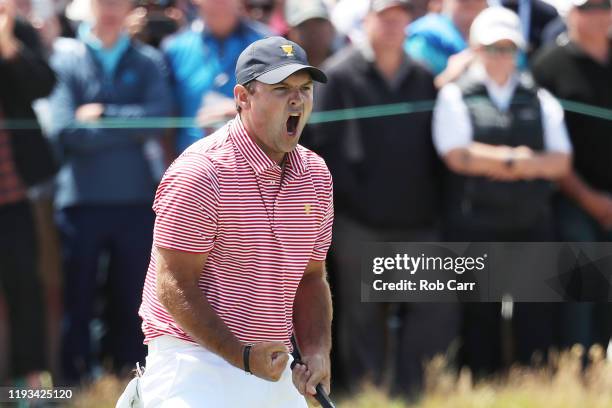 Patrick Reed of the United States team reacts on the 16th green during Thursday four-ball matches on day one of the 2019 Presidents Cup at Royal...