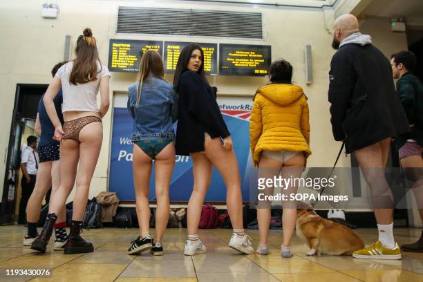 People without trousers are seen at Paddington Station as they take part during the 11th 'No Trousers Tube Ride' event on the London underground. The...