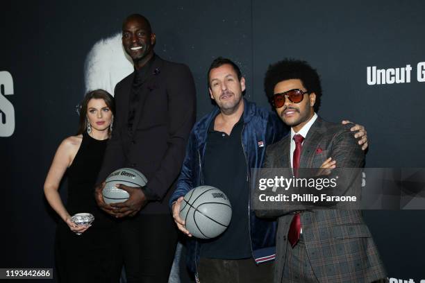 Julia Fox, Kevin Garnett, Adam Sandler and The Weeknd attend the premiere of A24's "Uncut Gems" at The Dome at Arclight Hollywood on December 11,...