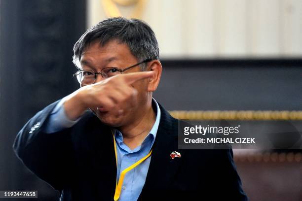 Mayor of Taipei Ko Wen-je gestures after signing an agreement with the mayor of Prague on January 13, 2020 at the Old Town Hall in Prague. - Zdenek...