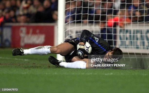 Chelsea's Goalkeeper Carlo Cudicini saves a penalty from Liverpool's Gay McAllister 16 December 2001, during their Premiership soccer match at...