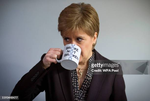 First Minister Nicola Sturgeon has a cup of tea during a visit to the Broke not Broken food bank on January 13, 2020 in Kinross, Scotland. The first...