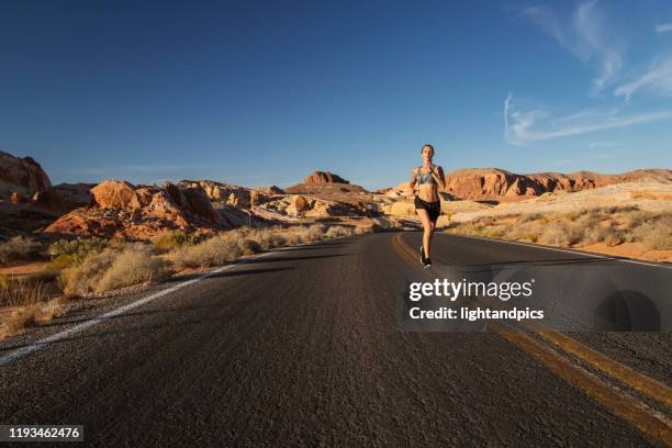 road run - hot woman in a bra stock pictures, royalty-free photos & images