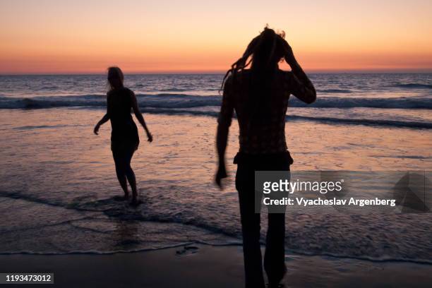 dance party on the beach, late twilight hour, morjim, goa - goa nightlife stock pictures, royalty-free photos & images