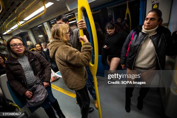 People with no pants ride in the subway. The annual No Pants Subway Ride took place in 20 major cities across the globe, the event was created in...