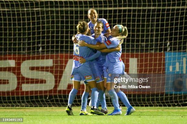 Melbourne City players celebrate after Yukari Kinga of Melbourne City scores a later goal during the round five W-League match between Melbourne City...