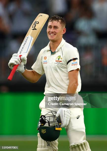 Marnus Labuschagne of Australia celebrates scoring a century during day one of the First Test match between Australia and New Zealand at Optus...