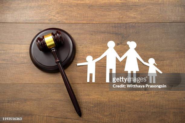family law concept. figures and gavel. divorce. - family law stockfoto's en -beelden