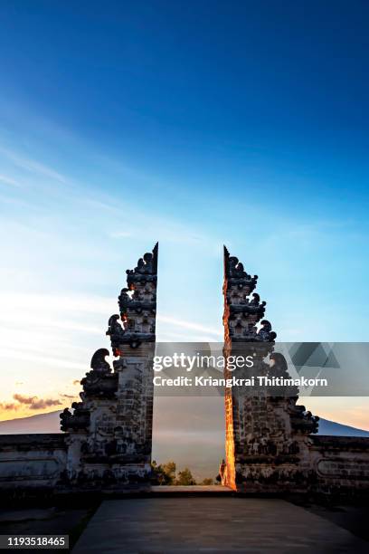 sunset at pura penataran agung lempuyang. - agung volcano in indonesia stock pictures, royalty-free photos & images