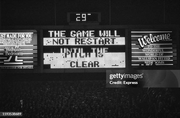 Board reading 'The Game Will Not Restart Until The Clear' during the 'Luton Riot', which happened during Luton Town and Millwall FA Cup match at...