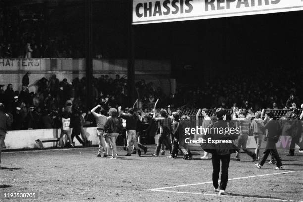 Fans invade the field during the "Luton Riot", which happened during Luton Town and Millwall FA Cup match at Kenilworth Road ground, Luton, UK, 13th...