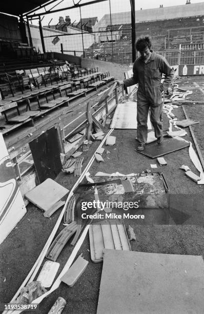Luton Riots An attendant cleaning up Luton Town's Kenilworth Road ground the day ...