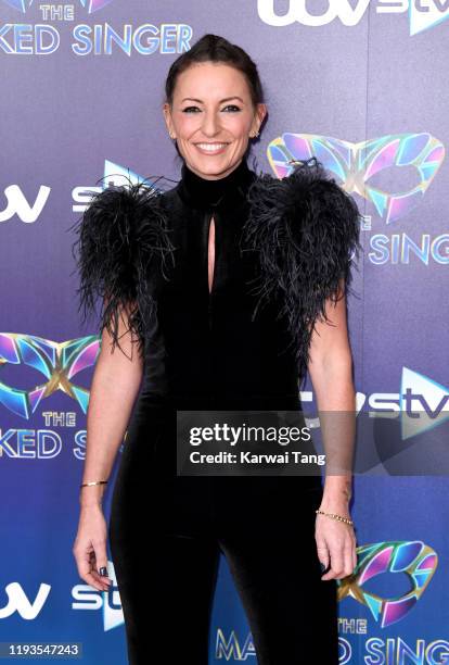 Davina McCall attends "The Masked Singer" photocall at The Mayfair Hotel on December 12, 2019 in London, England.