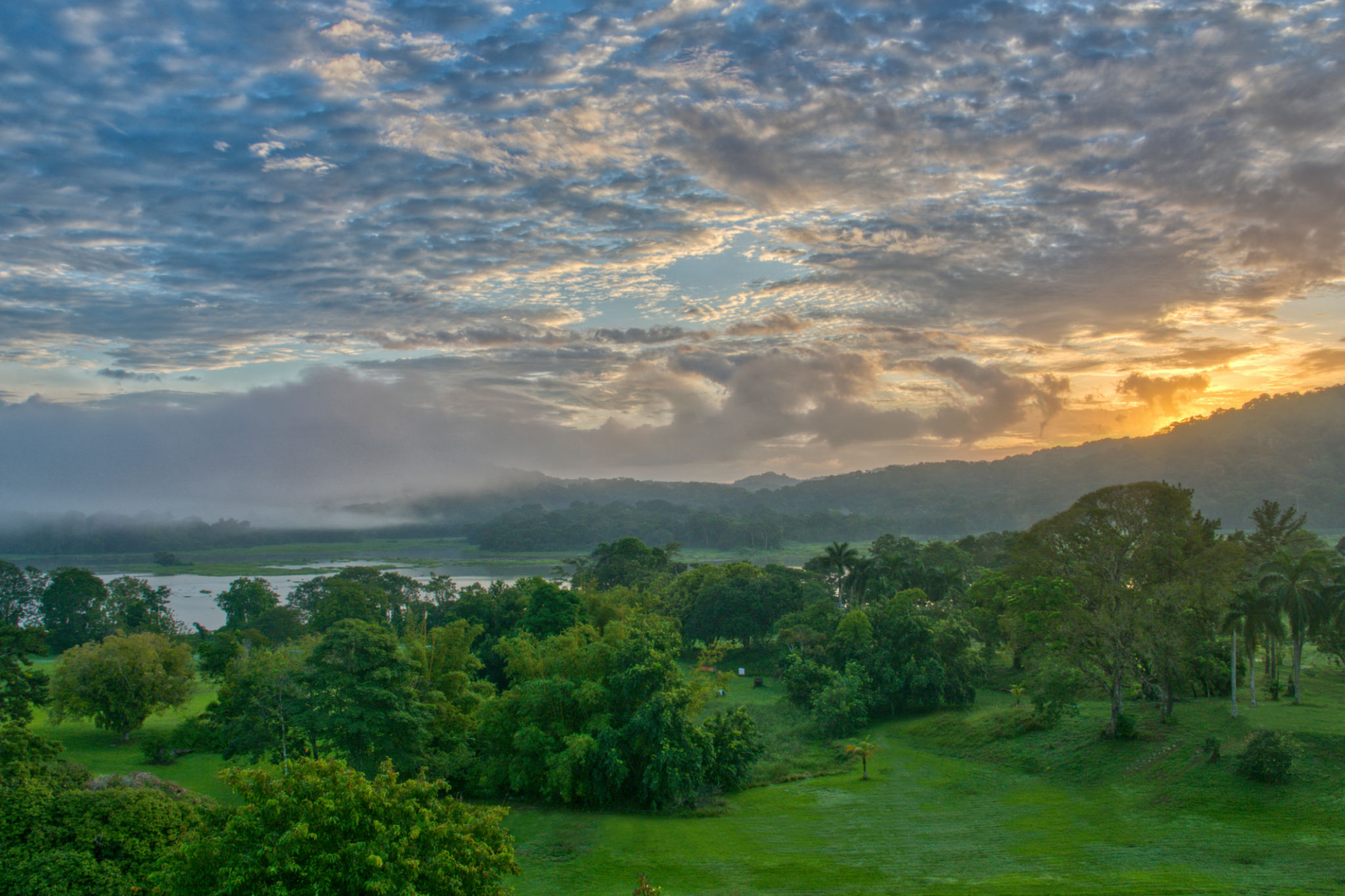 Beautiful Sunrise Over the Chagres River and Panama Canal in Soberania National Park of Gamboa, Panama in Central America Beautiful Sunrise Over the Chagres River and Panama Canal in Soberania National Park of Gamboa, Panama in Central America