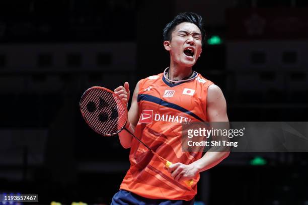 Kento Momota of Japan celebrate the victory in the Men's Singles round robin match against Anders Antonsen of Denmark during day two of the HSBC BWF...