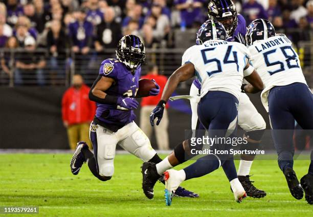 Baltimore Ravens running back Mark Ingram II runs the ball on January 11 at M&T Bank Stadium in Baltimore, MD. In the AFC Divisional Playoff against...