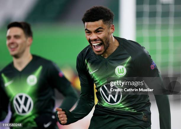 Paulo Otavio of VfL Wolfsburg celebrates after scoring his team's first goal during the UEFA Europa League group I match between VfL Wolfsburg and AS...