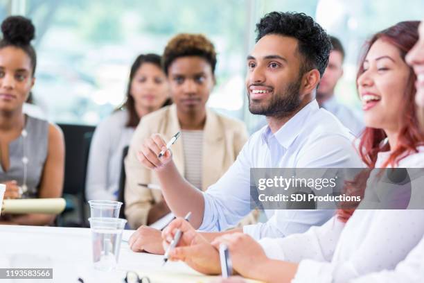 indian businessman participate in panel discussion - town hall meeting stock pictures, royalty-free photos & images