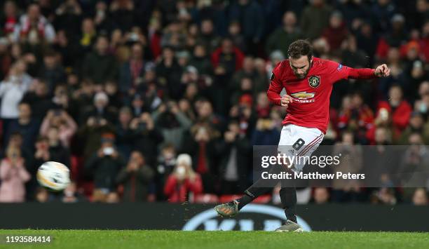 Juan Mata of Manchester United scores their third goal during the UEFA Europa League group L match between Manchester United and AZ Alkmaar at Old...