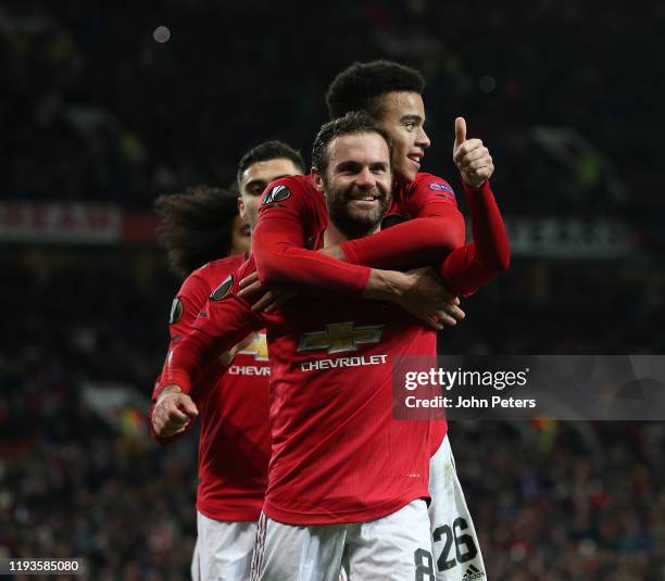 Juan Mata of Manchester United celebrates scoring their third goal during the UEFA Europa League group L match between Manchester United and AZ...