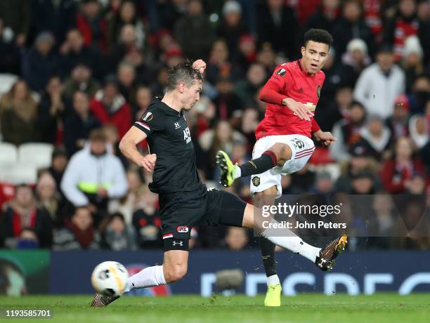 Mason Greenwood of Manchester United scores their fourth goal during the UEFA Europa League group L match between Manchester United and AZ Alkmaar at...