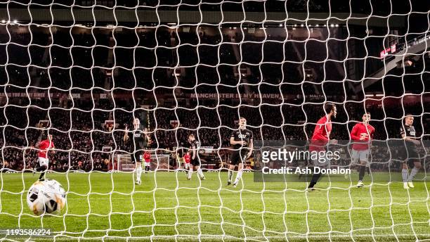 Juan Mata of Manchester United celebrates scoring their third goal during the UEFA Europa League group L match between Manchester United and AZ...