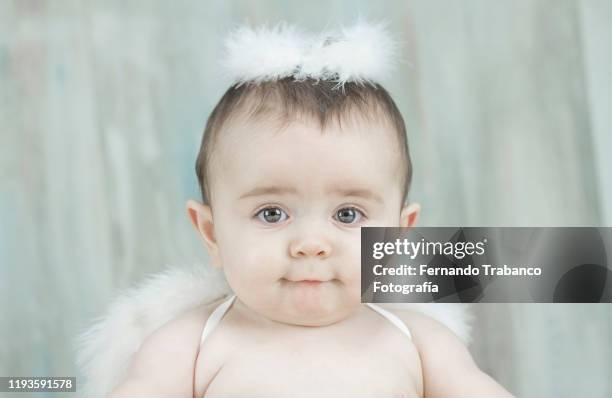 angelic baby - baby angel fotografías e imágenes de stock