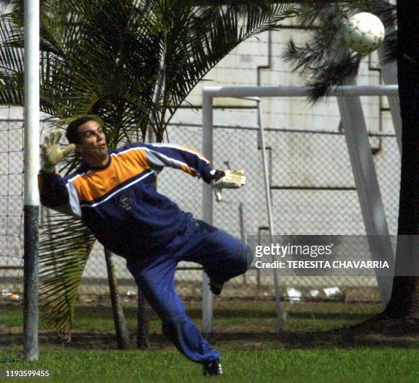 The goalkeeper Alvaro Mesen tries to catch a ball 03 January 2001 during a training session in San Antonio de Belen, Heredia, Costa Rica. El arquero...