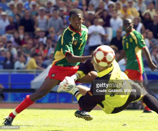 Cameroon's Samuel Eto'o Fils scores 30 September 2000 during the soccer final of Sydney 2000 Olympic games. Cameroon won the gold medal. AFP...