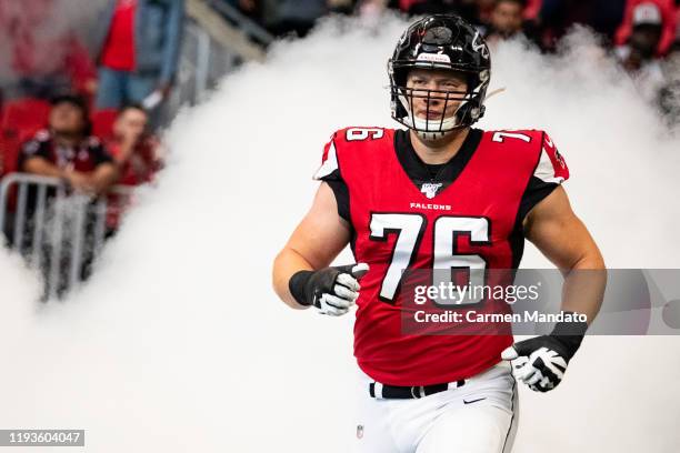 Kaleb McGary of the Atlanta Falcons takes the field prior to the game against the Carolina Panthers at Mercedes-Benz Stadium on December 8, 2019 in...