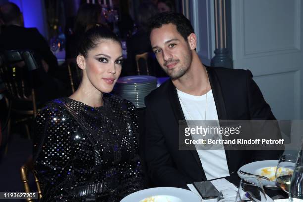 Miss France and Miss Universe 2016 Iris Mittenaere and her companion Diego El Glaoui attend the Annual Charity Dinner hosted by the AEM Association...