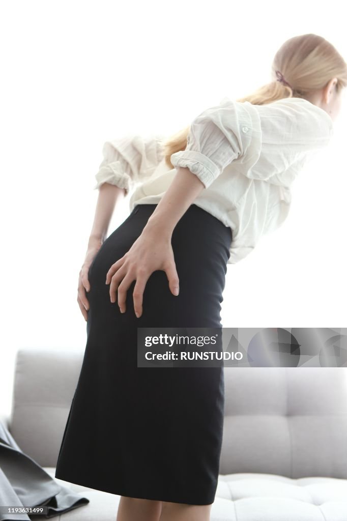 Woman With Pain In Buttocks