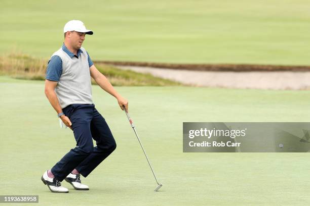 Justin Thomas of the United States team reacts to a missed putt on the 16th green during Friday foursome matches on day two of the 2019 Presidents...