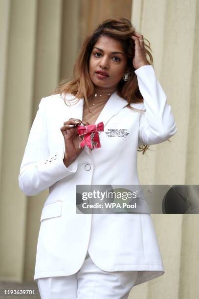 Rapper and singer M.I.A. With her MBE following an investiture ceremony at Buckingham Palace on January 14, 2020 in London, United Kingdom.