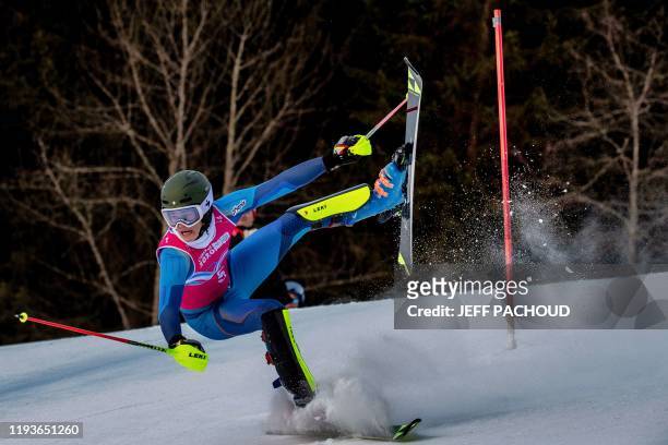Norwegian skier Mikkel Remsoey falls as he competes in the mens alpine skiing slalom of Lausanne 2020 Winter Youth Olympic Games on January 14, 2020...