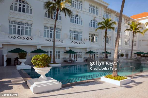 The pool at the Eastern & Oriental Hotel in Penang, Malaysia. Built in 1885 on George Towns north facing waterfront, the E&O was the first of the...