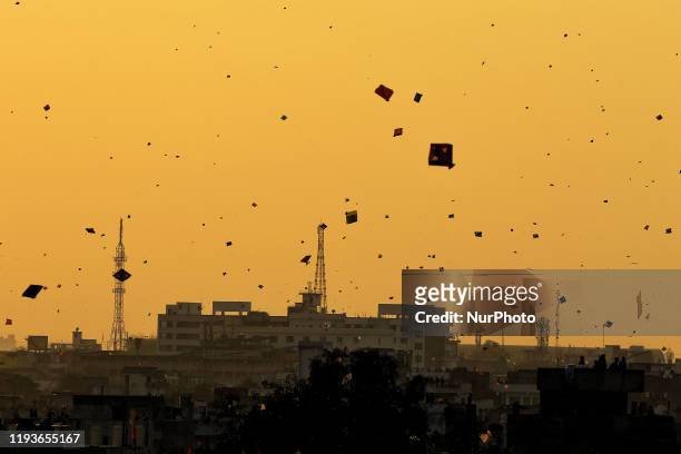 People fly kites in the sky on the occasion of the Makar Sakranti at walled city area of Jaipur, Rajasthan, India. Jan 14, 2020.