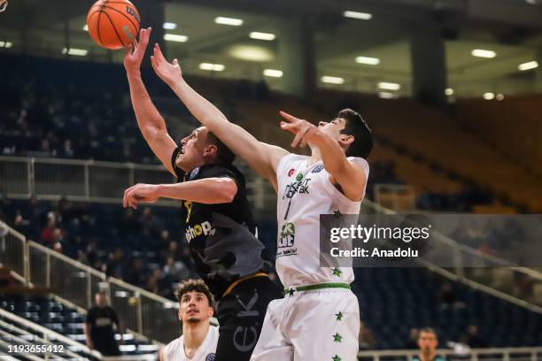 Furkan Haltali of Teksut Bandirma in action against Jonas Maciulis of AEK Athens, during the FIBA Basketball Champions League, season 2019-20,...