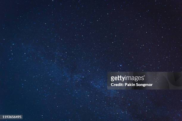 milky way galaxy with stars and space dust in the universe - estrelas imagens e fotografias de stock