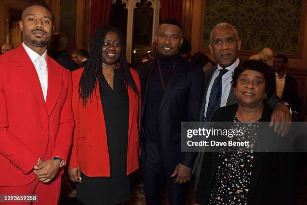 Michael B. Jordan, Marsha De Cordova MP, Jamie Foxx, Lord Simon Woolley and Baroness Doreen Lawrence attend an evening at the House Of Lords for the...